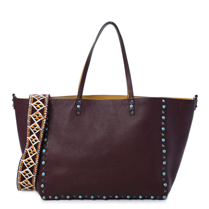 Valentino Garavani Stampa Alce Calfskin Medium Guitar Strap Rockstud Rolling Reversible Tote Wine Yellow 1 of 4