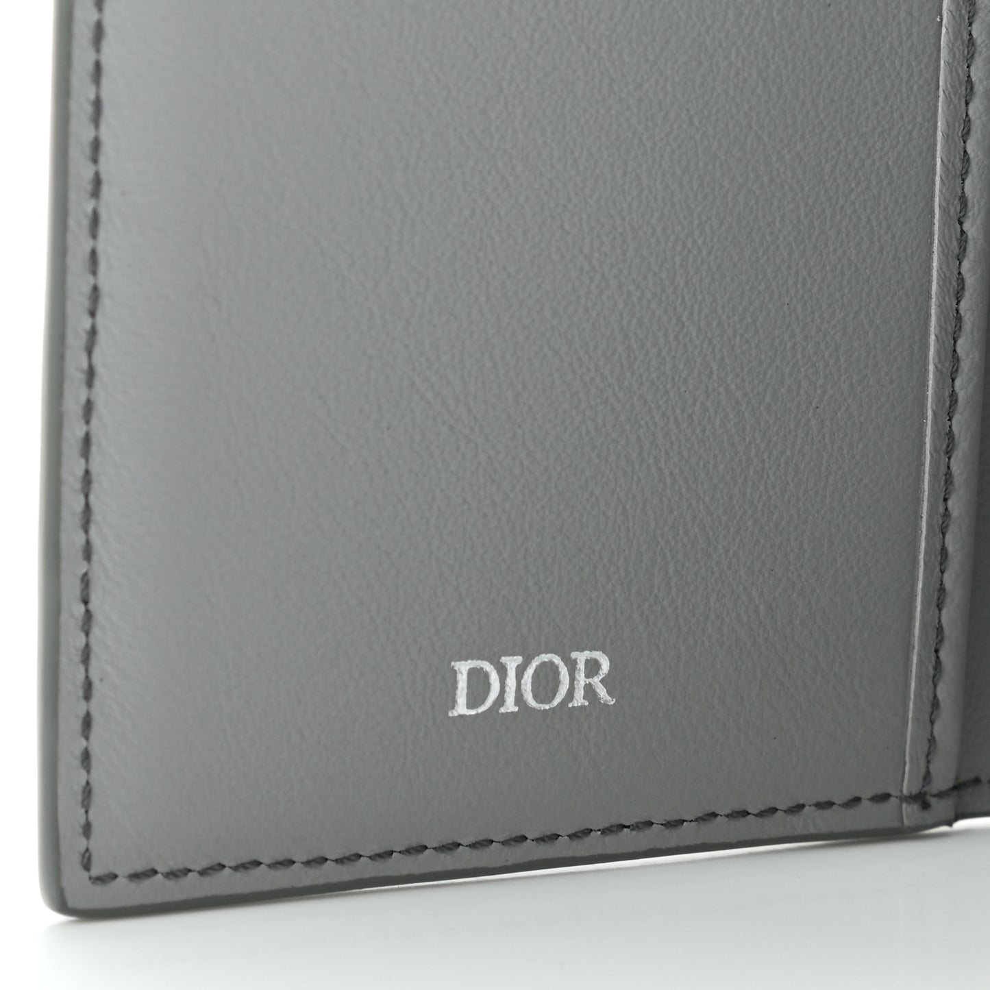 Calfskin Perforated Oblique Bi-Fold Card Holder Grey