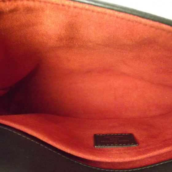 Damier Sauvage Lionne