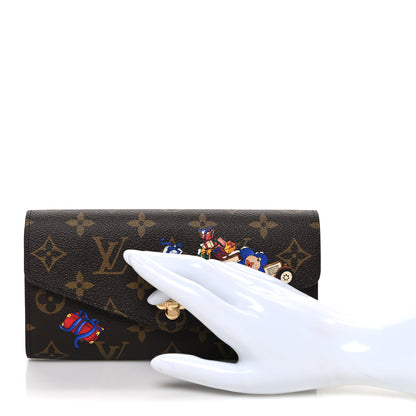 Louis Vuitton Monogram House Mascot Sarah Wallet NM Iced Gold 2 of 7