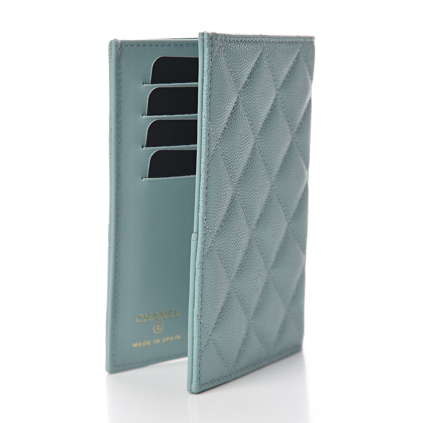 Caviar Quilted Passport Holder Blue