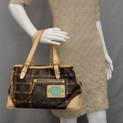 Louis Vuitton Monogram Riveting 2 of 7