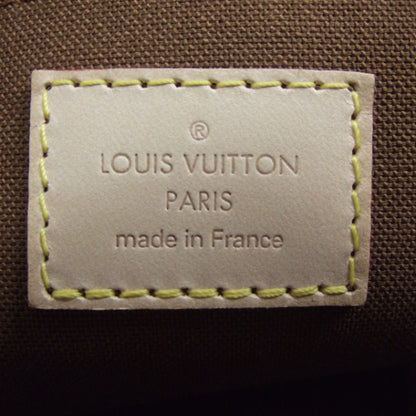 Louis Vuitton Monogram Riveting 8 of 9