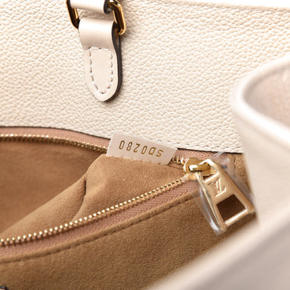 Louis Vuitton Empreinte Monogram Giant Onthego GM Creme 9 of 9