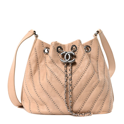 Chanel Metallic Calfskin Studded Chevron Quilted Small Stud Wars Drawstring Bag Beige 1 of 10