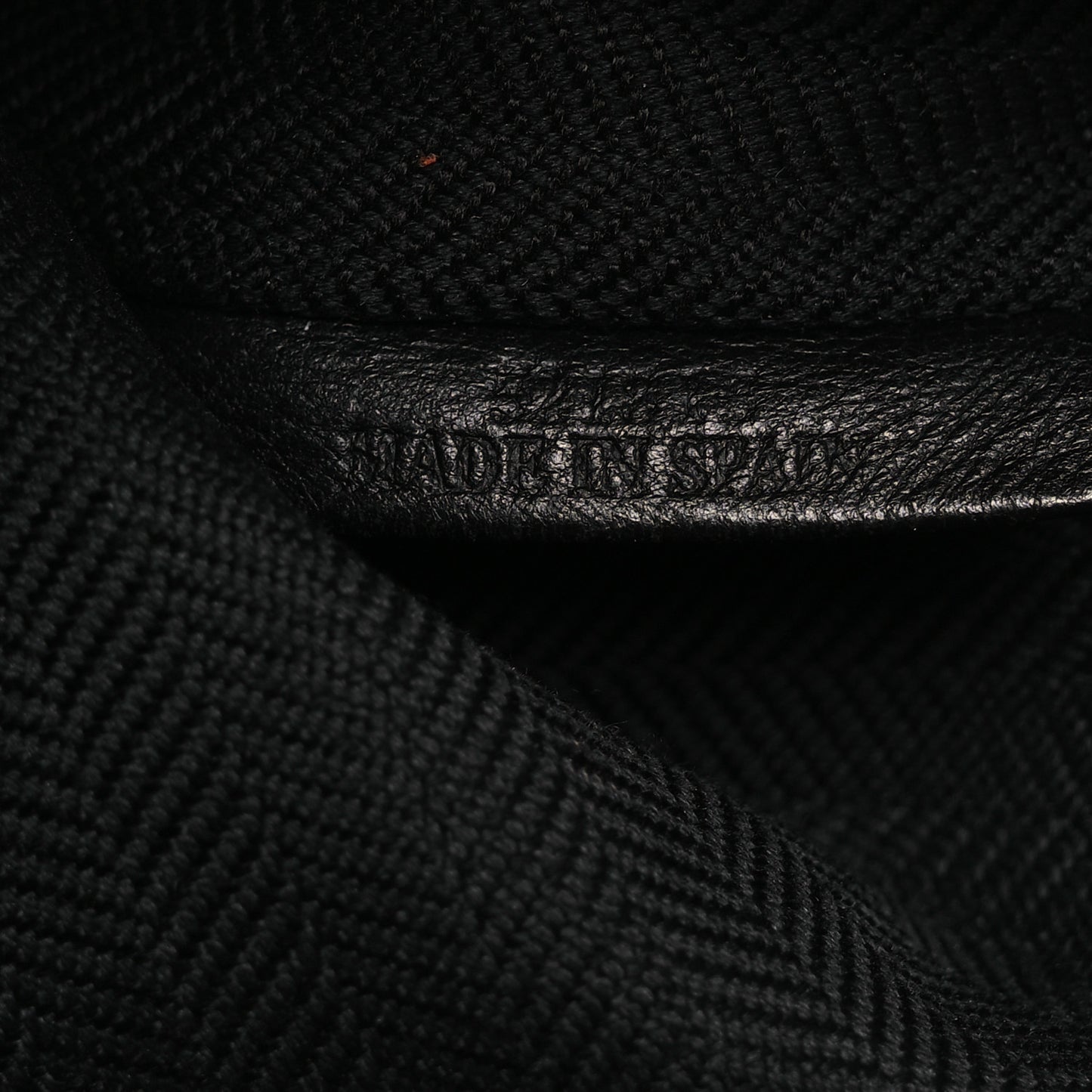 Calfskin Embossed Repeat T Pouch Black