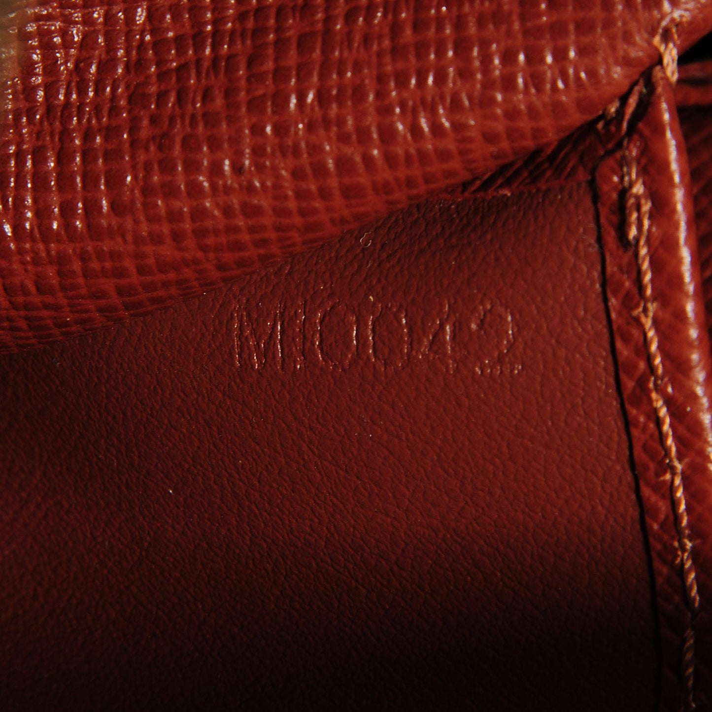 Monogram Pochette Cite