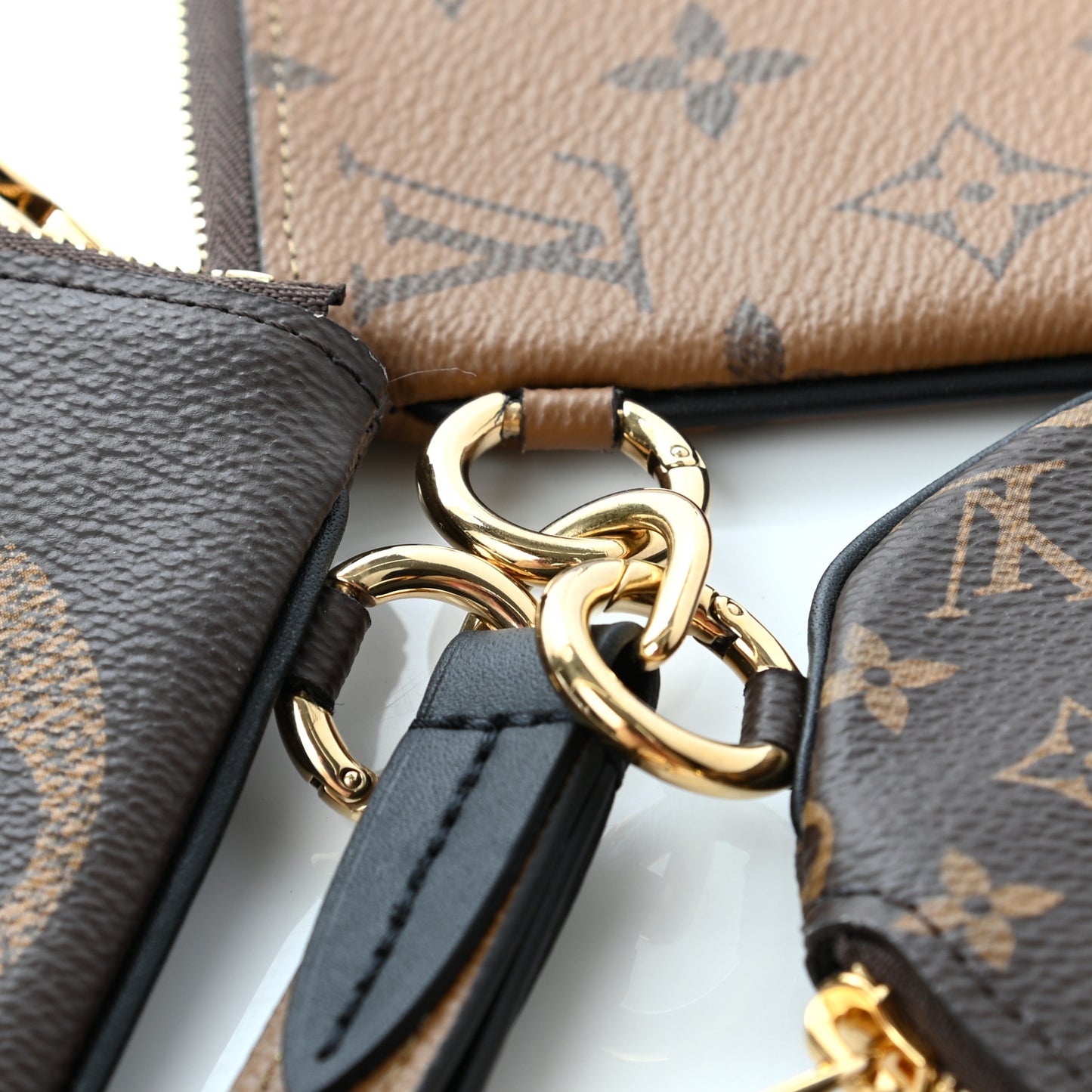 Reverse Monogram Giant Trio Pouch