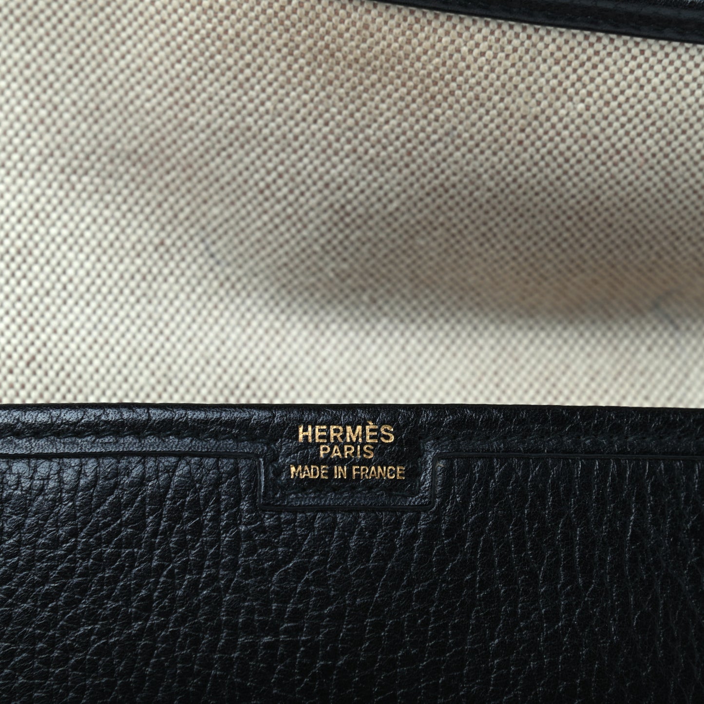 Togo Swift Jige PM Clutch Black Gold