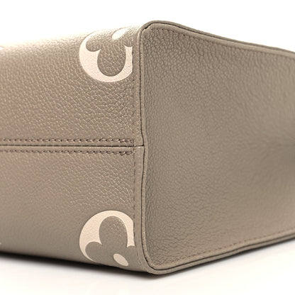 Louis Vuitton Empreinte Monogram Giant Onthego PM Tourterelle Creme 9 of 9