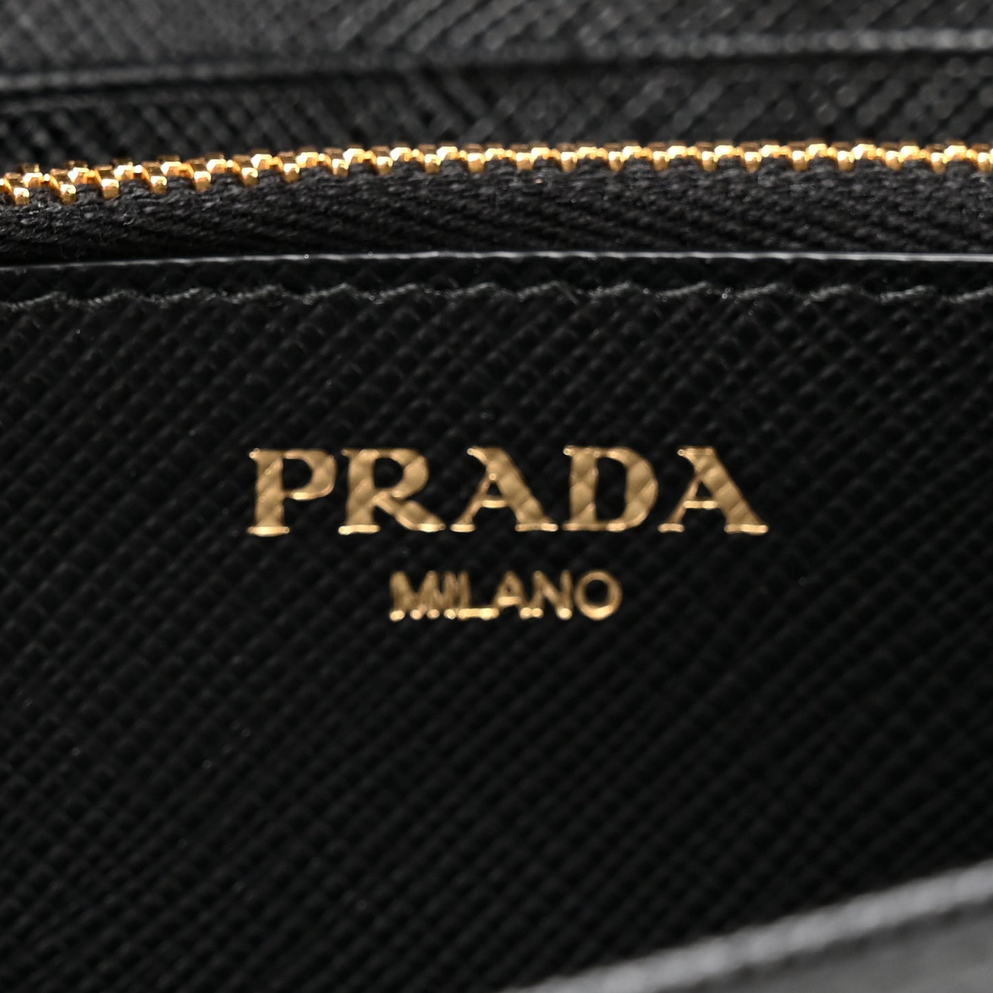 Tessuto Saffiano Triangle Logo Continental Flap Travel Wallet Black