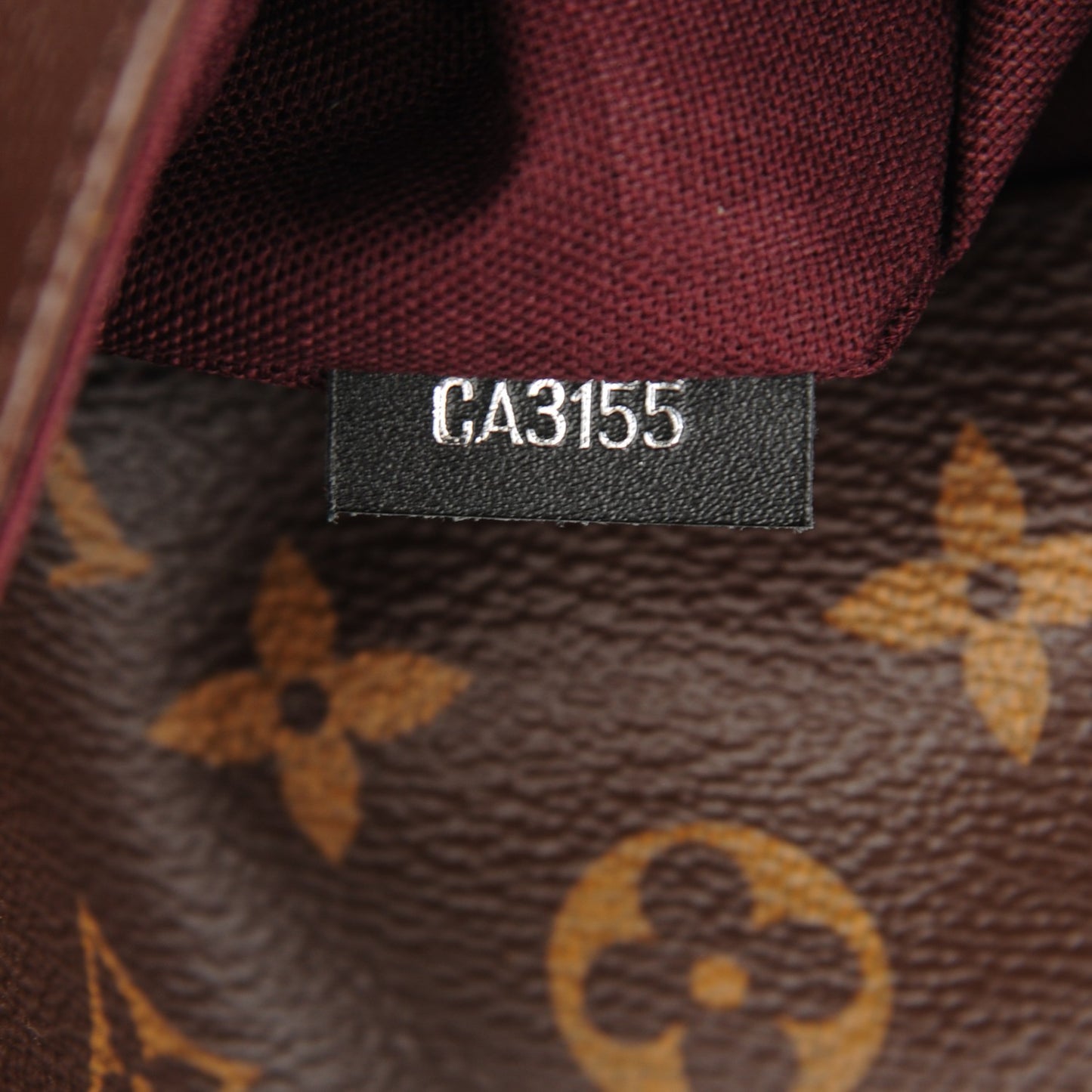 Monogram Macassar District PM