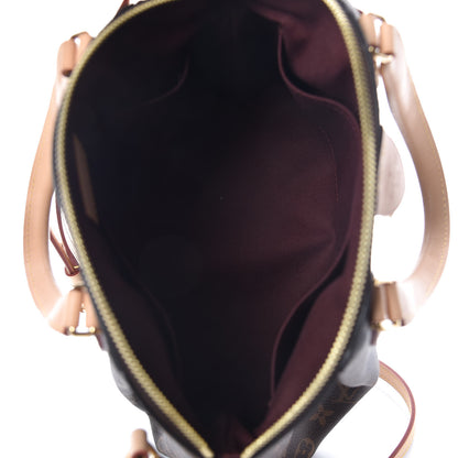 Louis Vuitton Monogram Rivoli PM 6 of 10