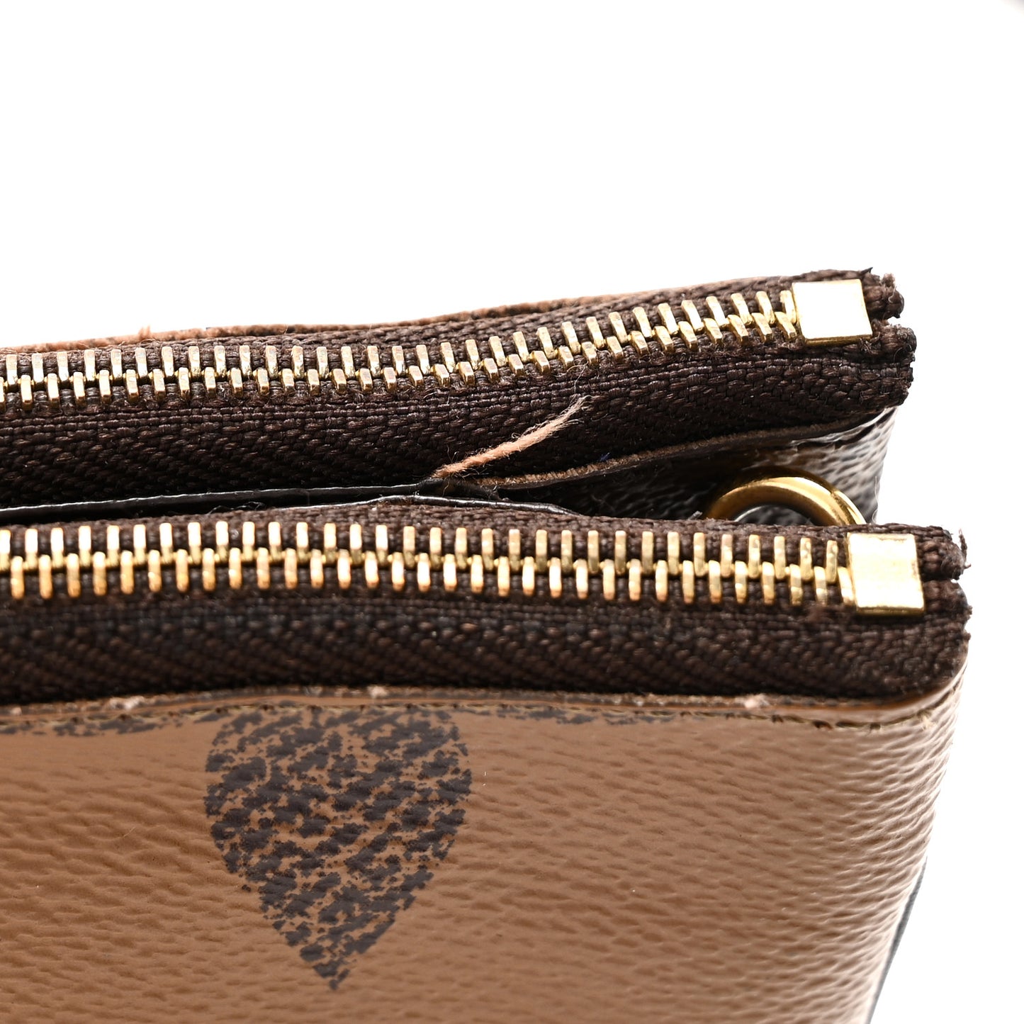 Reverse Monogram Giant Double Zip Pochette