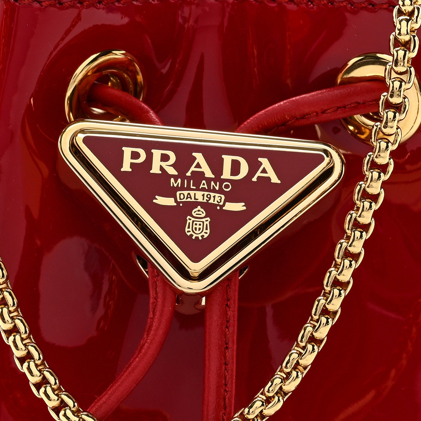 Vernice Metal Triangle Logo Mini Drawcord Pouch Shoulder Bag Cherry