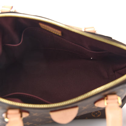 Louis Vuitton Monogram Rivoli MM 4 of 7