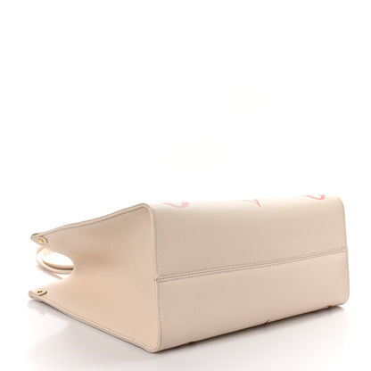 Louis Vuitton Empreinte Monogram Giant Onthego MM Creme Rose Trianon 4 of 8
