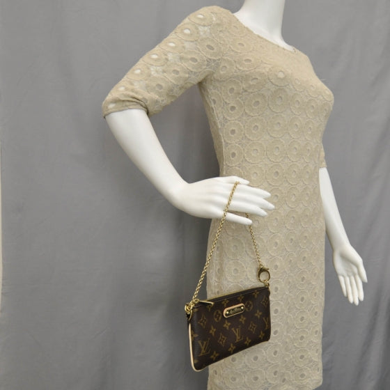 Louis Vuitton Monogram Milla Clutch MM 2 of 10