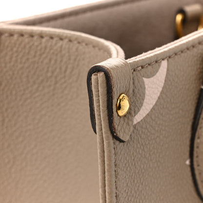Louis Vuitton Empreinte Monogram Giant Onthego PM Tourterelle Creme 12 of 13