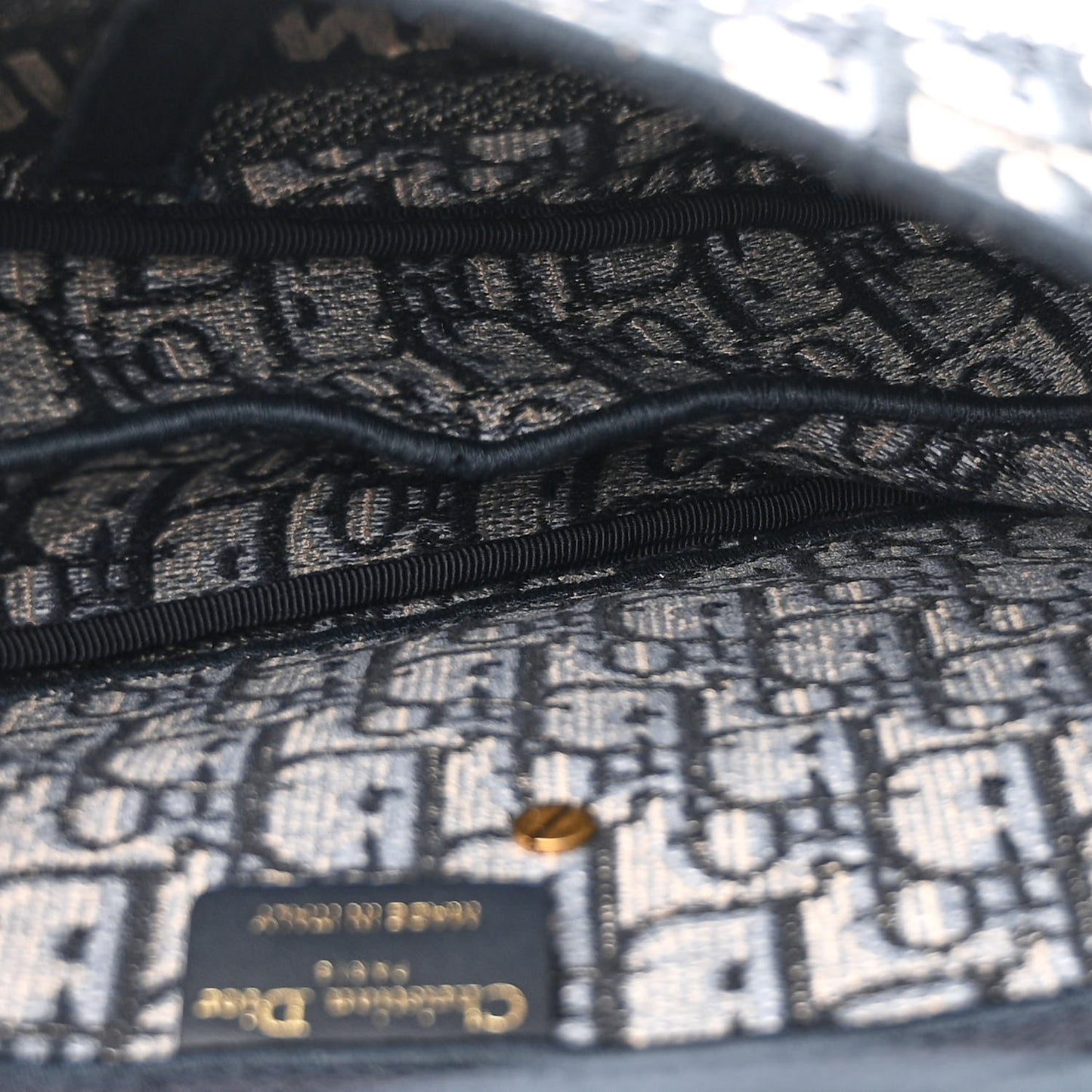 Oblique Embroidered Saddle Bag Blue