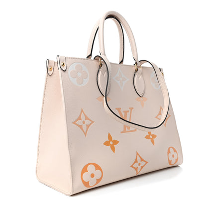 Louis Vuitton Empreinte Monogram Giant By The Pool Onthego MM Cream Saffron 2 of 4