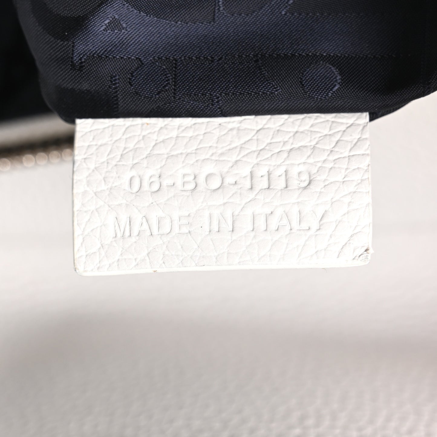 X DANIEL ARSHAM Grained Calfskin Newspaper Print Saddle Bag White