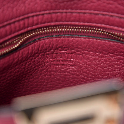 Valentino Garavani Pebbled Calfskin Mini Rockstud Flip-Lock Messenger Bag Raspberry 7 of 8
