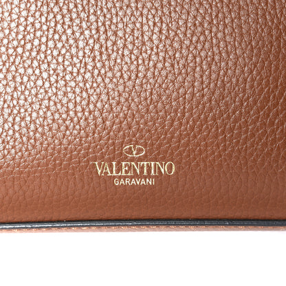 Valentino Garavani Pebbled Calfskin Medium Rockstud Flip Lock Crossbody Bag Bright Cognac 8 of 9