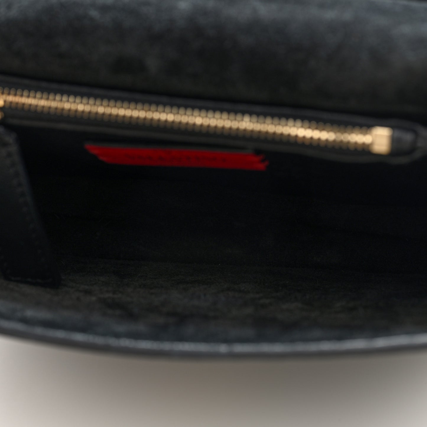 Pebbled Calfskin Rockstud Side Slip Crossbody Black