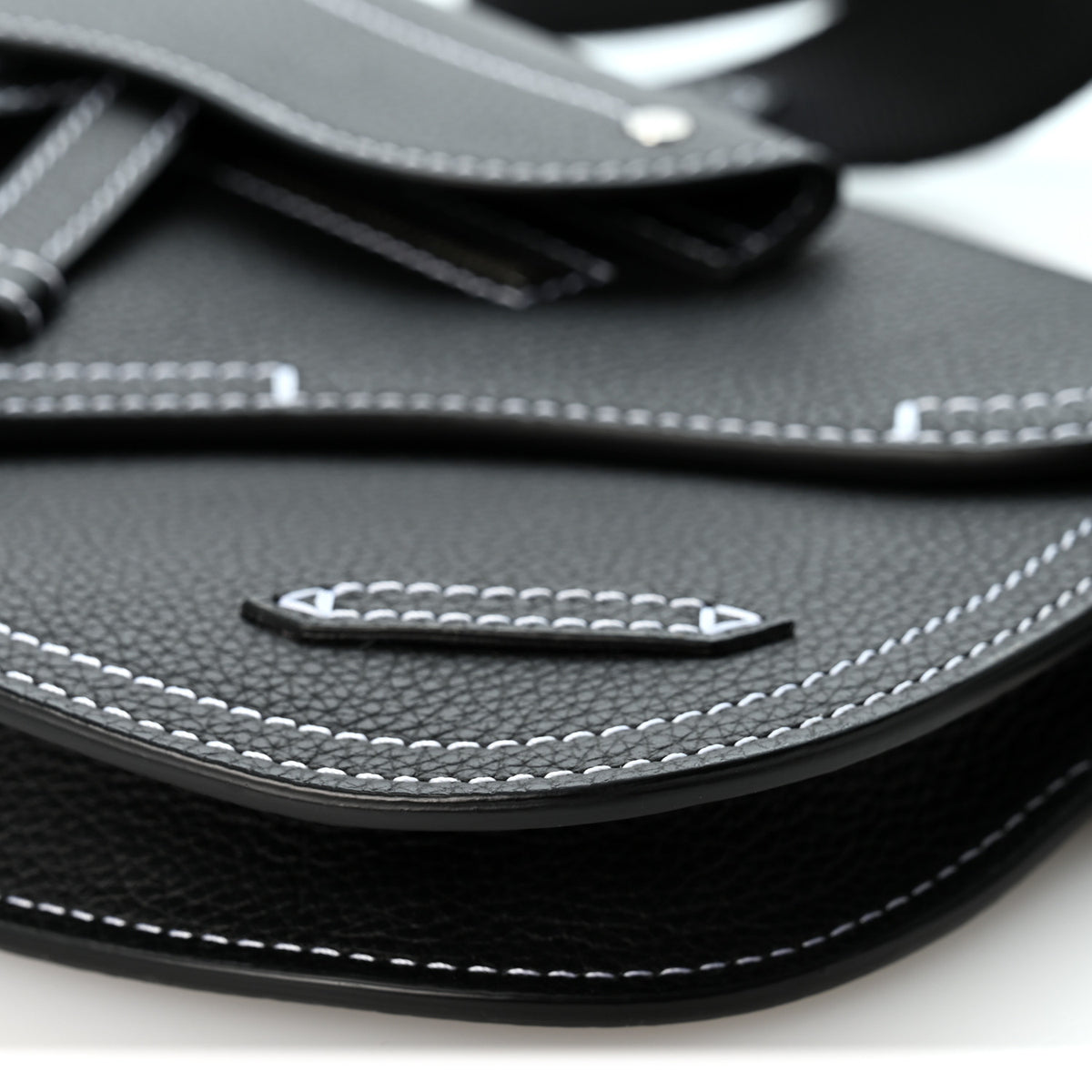 X KAWS Grained Calfskin Saddle Pouch Black
