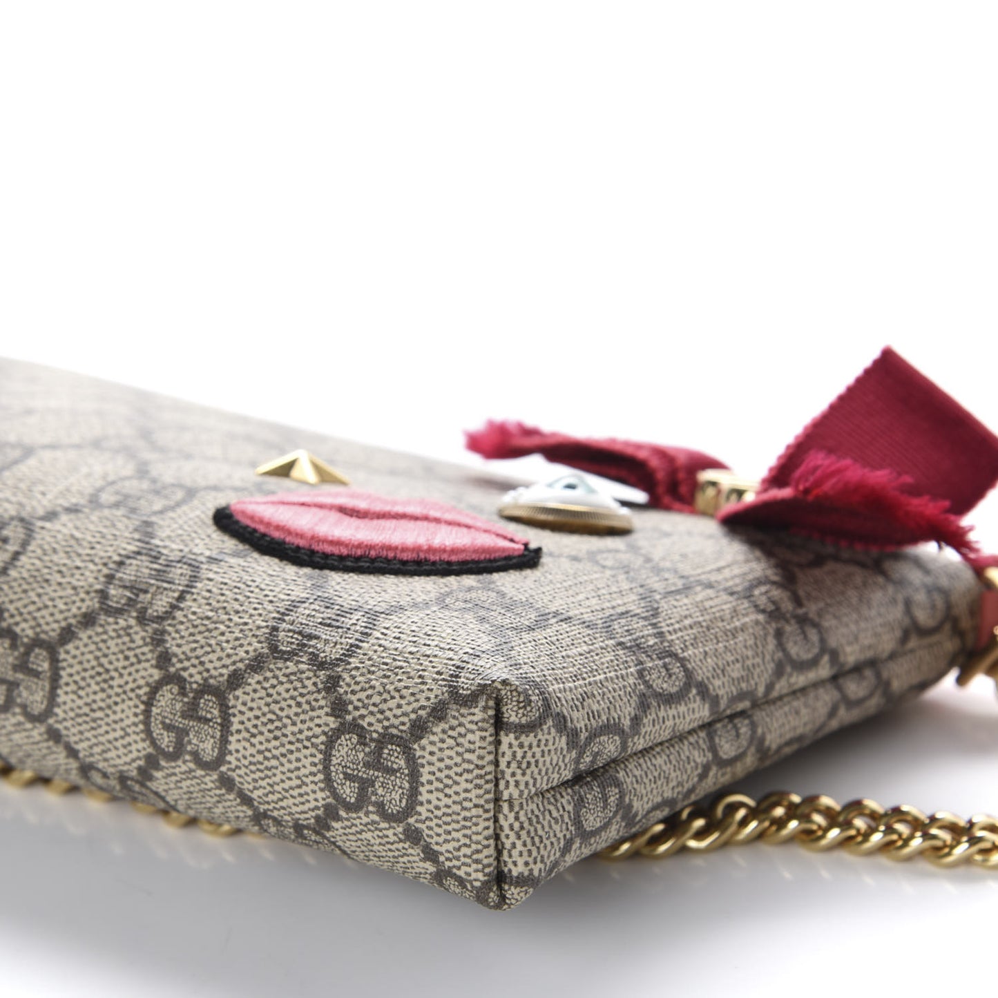 GG Supreme Monogram Face Embroidered Wrist Wallet Pink