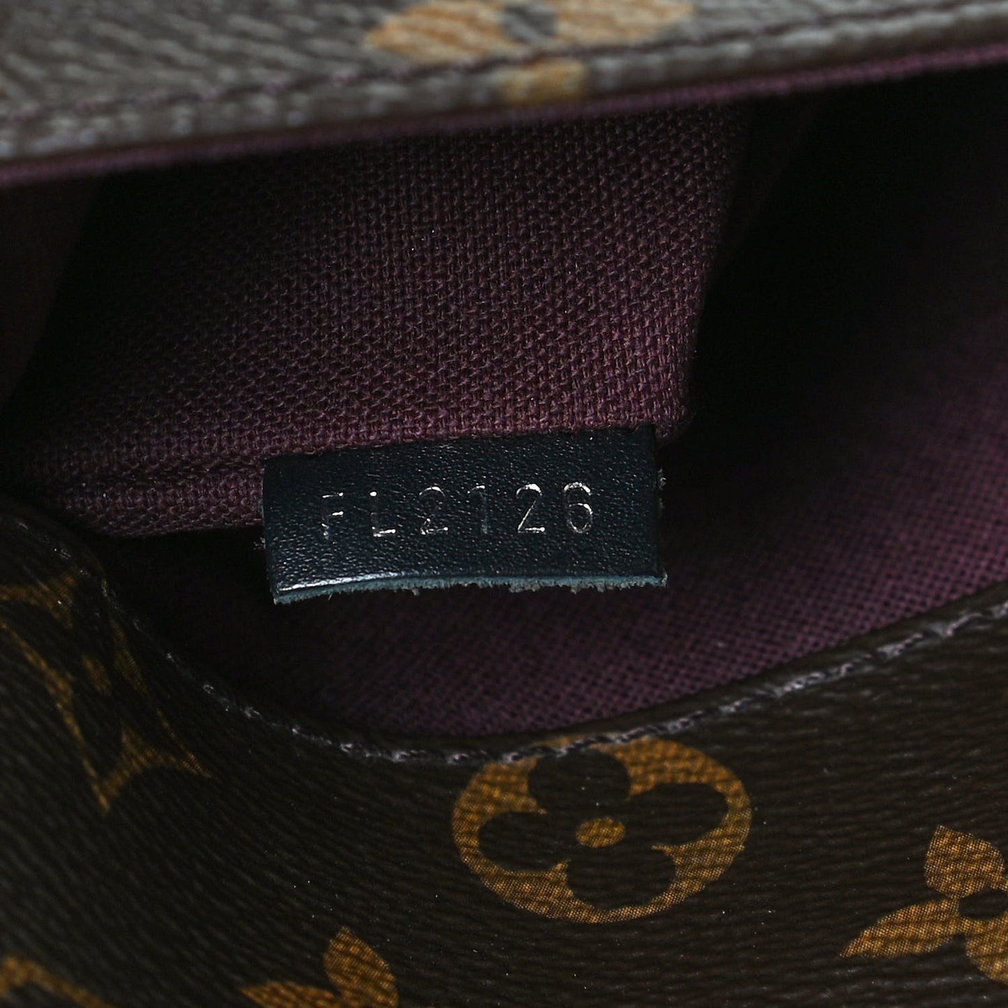 Monogram Macassar District MM