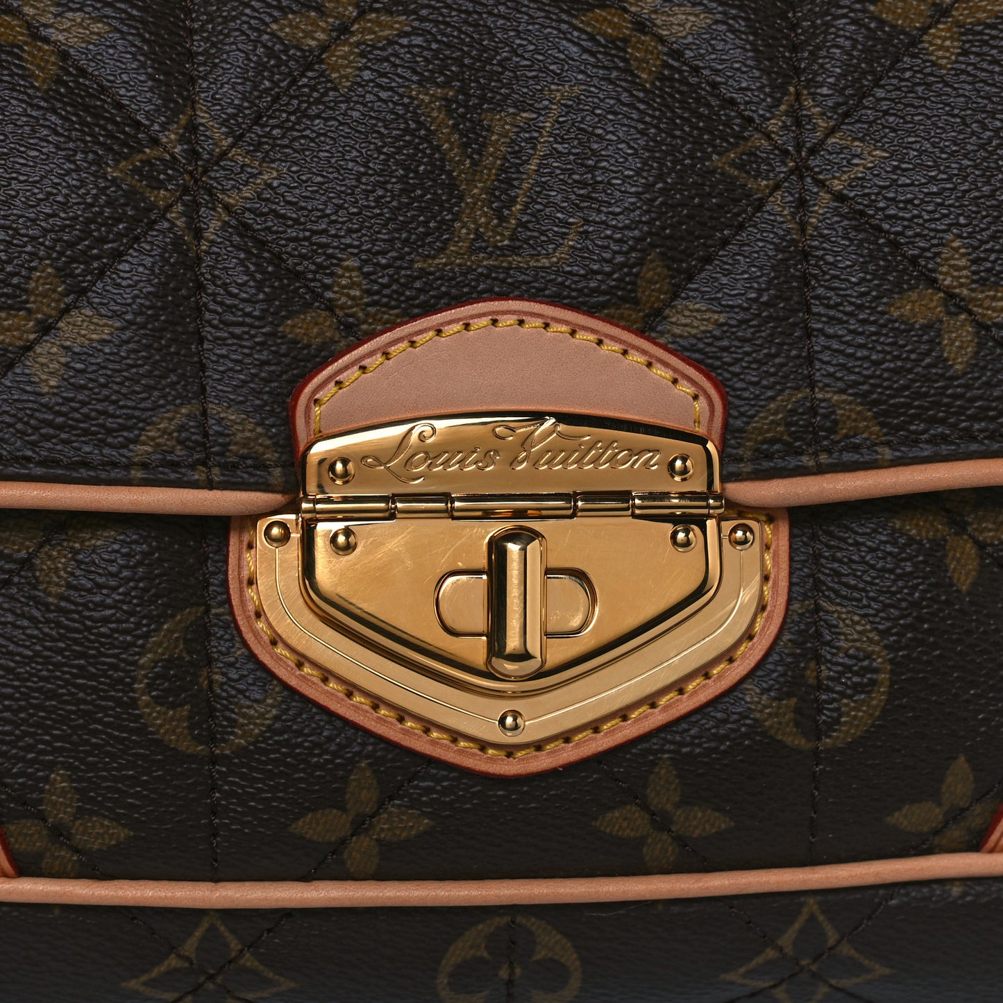 Monogram Etoile Clutch