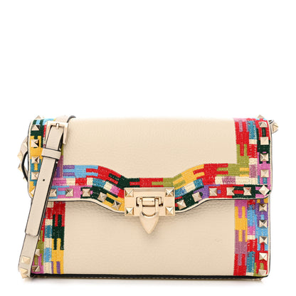 Valentino Garavani Pebbled Calfskin Embroidered Medium Rockstud Flip Lock Crossbody Bag Ivory 1 of 12