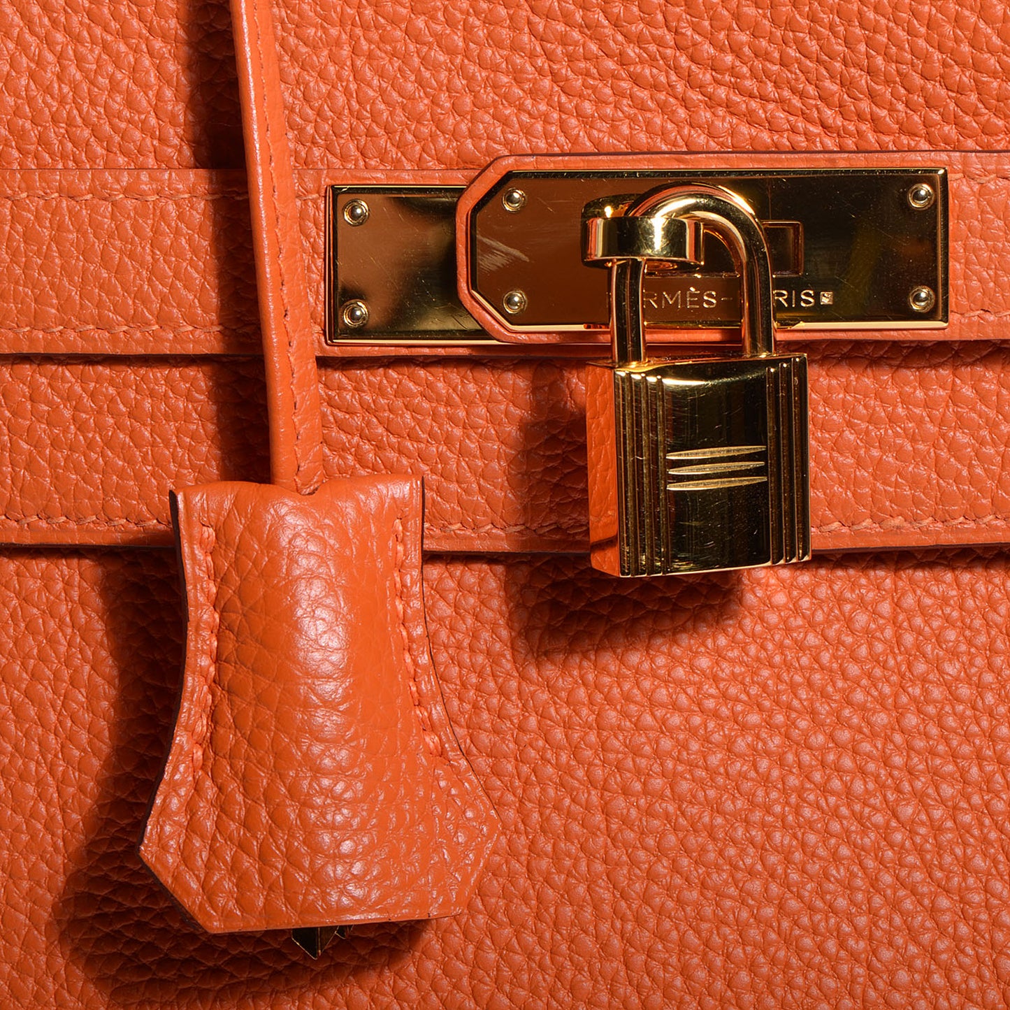 Togo Kelly Retourne 35 Orange