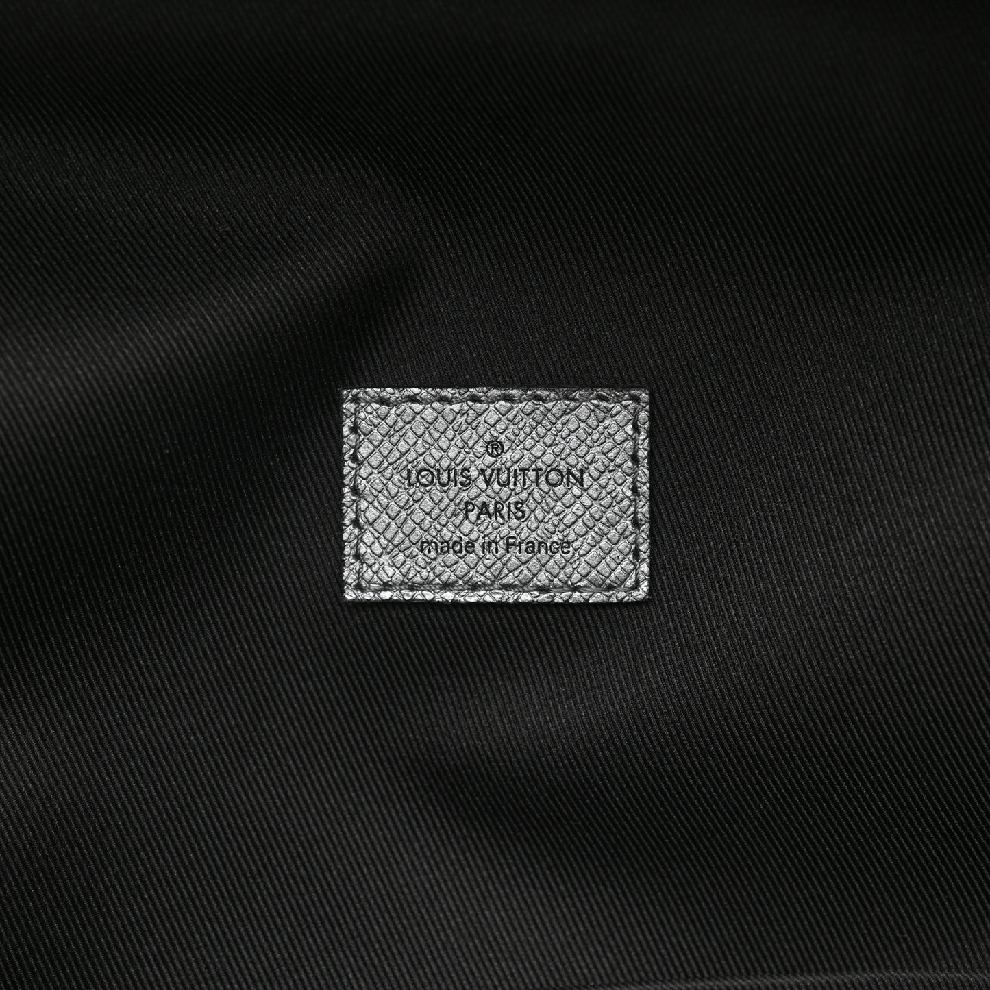 Monogram Taiga Discovery Backpack PM Silver