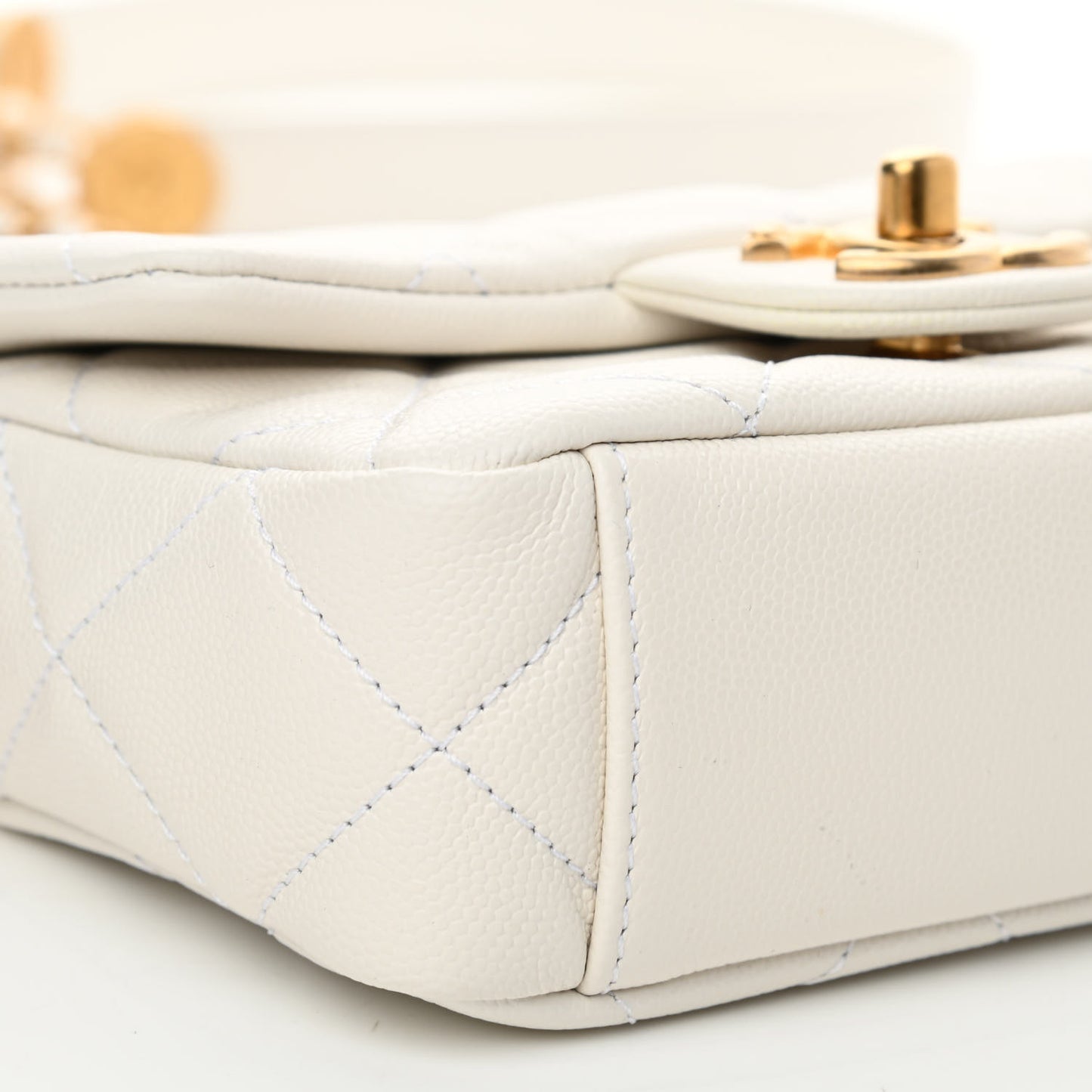 Caviar Quilted Mini Twist Your Buttons Flap White