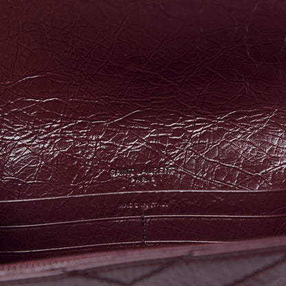 Saint Laurent Crinkled Calfskin Matelasse Monogram Niki Wallet Rouge Legion 8 of 8