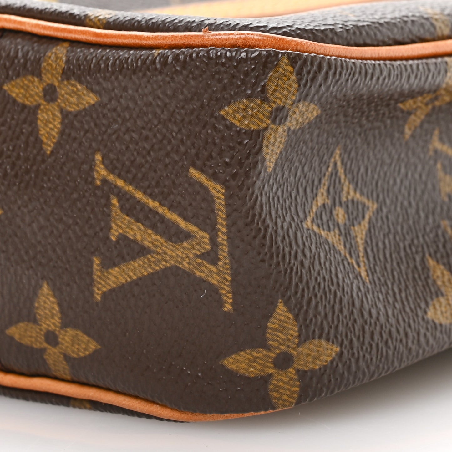 Monogram Pochette Cite