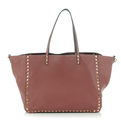 Valentino Garavani Pebbled Calfskin Medium Rockstud Reversible Tote Rubin Blush 1 of 7