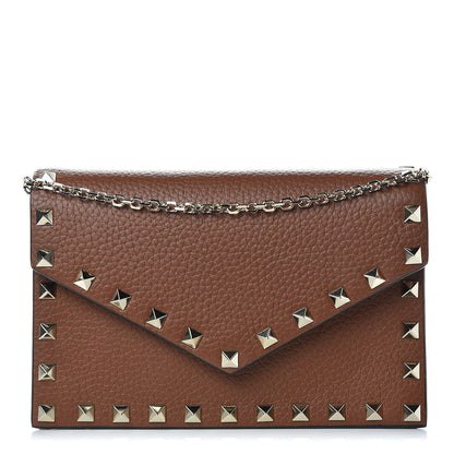 Valentino Garavani Pebbled Calfskin Rockstud Envelope Wallet on Chain Bright Cognac 1 of 8