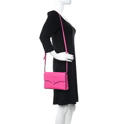 Valentino Garavani Pebbled Calfskin Enamel Monochrome Medium Rockstud Flip Lock Crossbody Bag Pink PP 2 of 9