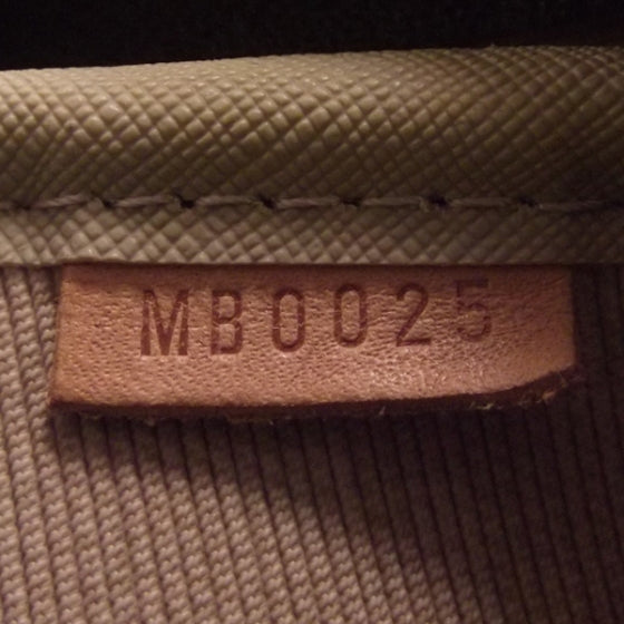 Louis Vuitton Monogram Evasion Sports Bag 8 of 9