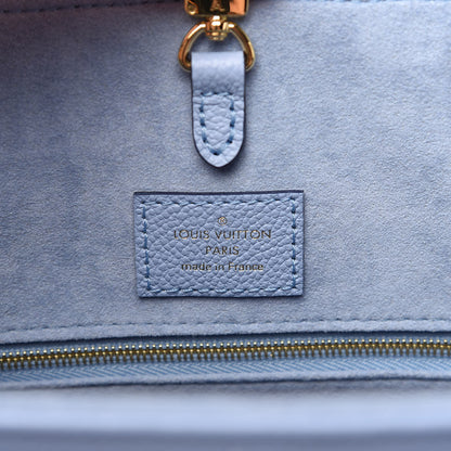 Louis Vuitton Empreinte Monogram Giant By The Pool Onthego MM Summer Blue 8 of 10