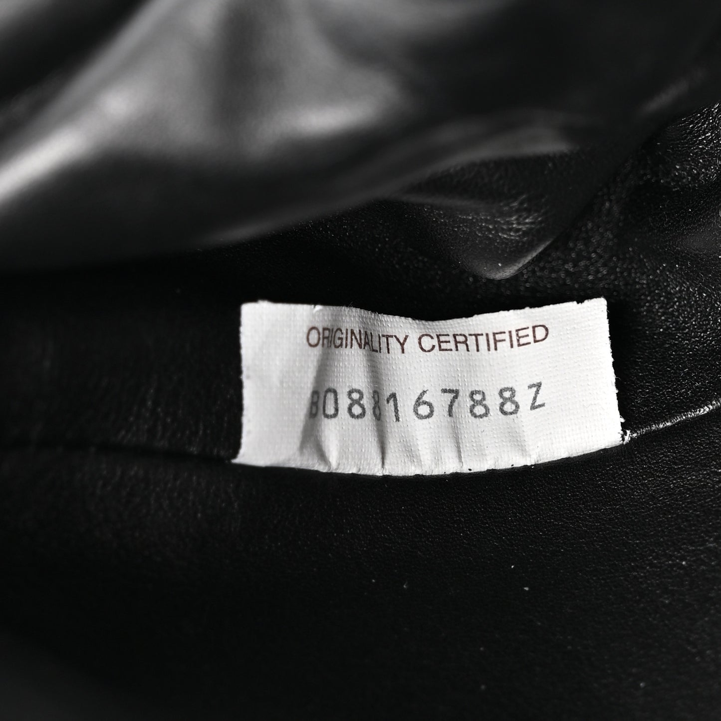 Butter Calfskin The Mini Pouch Black