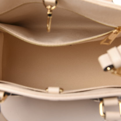 Louis Vuitton Empreinte Monogram Giant Onthego PM Creme Bois De Rose 5 of 10
