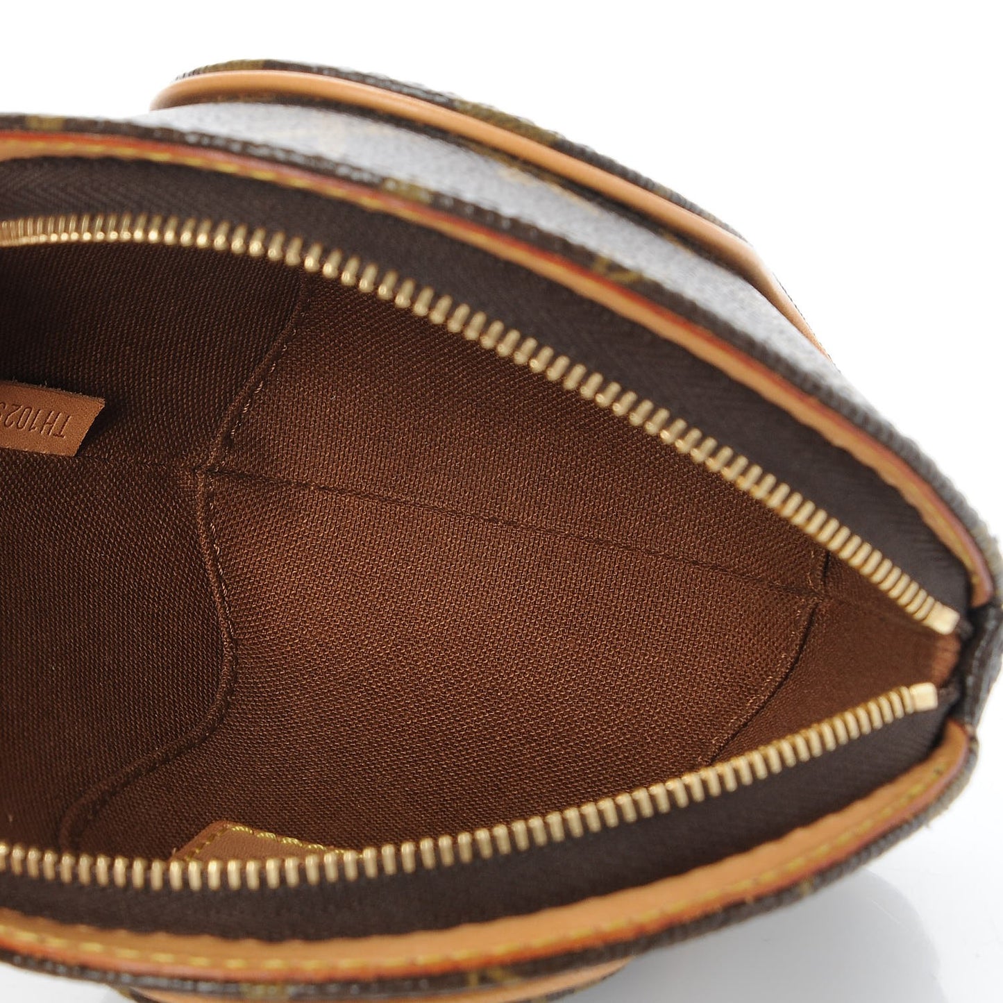 Monogram Mini Ellipse Wristlet Clutch