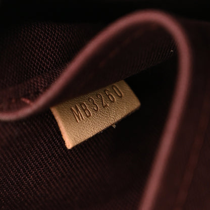 Louis Vuitton Monogram Rivoli PM 7 of 11