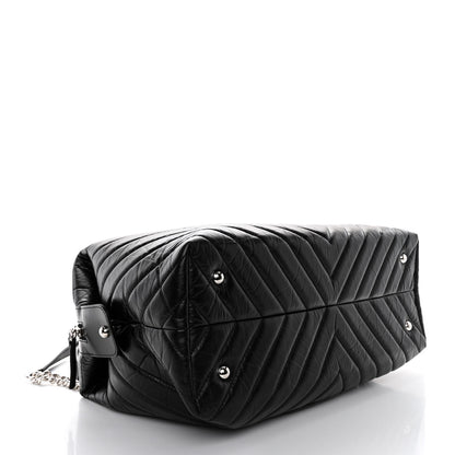 Chanel Aged Calfskin Chevron Quilted Duffle Bag Black 4 of 10