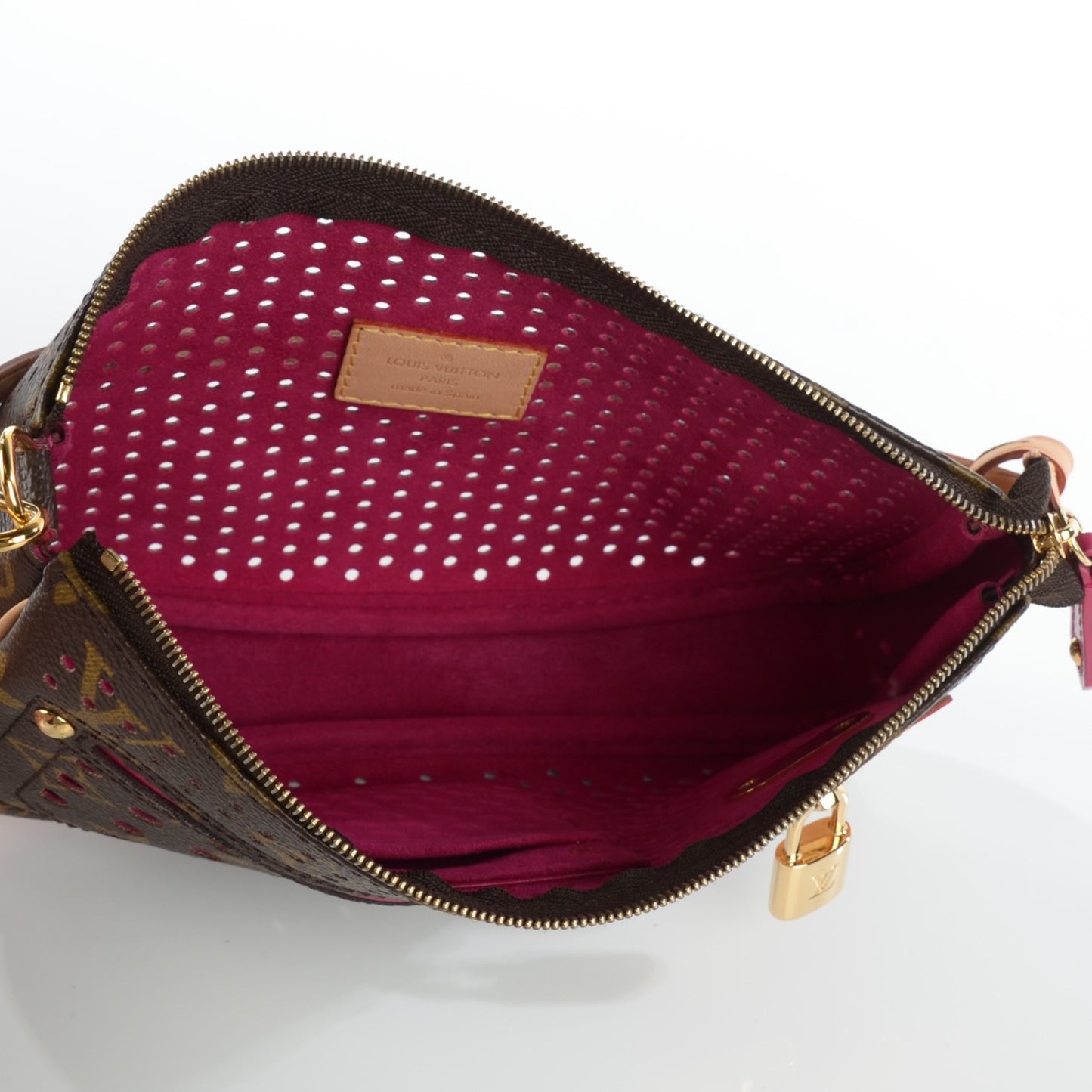 Monogram Perforated Pochette Accessories Bag Fuchsia